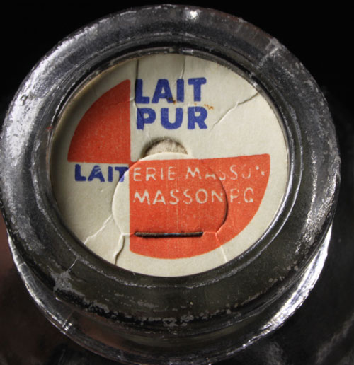 Capsule d’une bouteille de lait de la Laiterie Masson.
